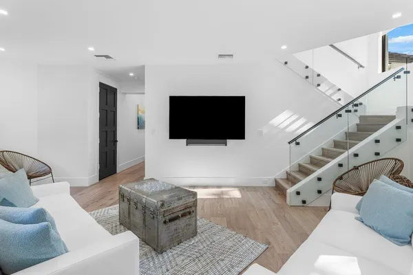 a view of swimming pool with lounge chair