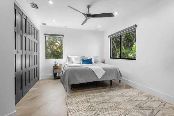 a view of a patio with swimming pool table and chairs