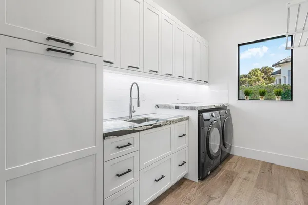 an aerial view of residential house with outdoor space