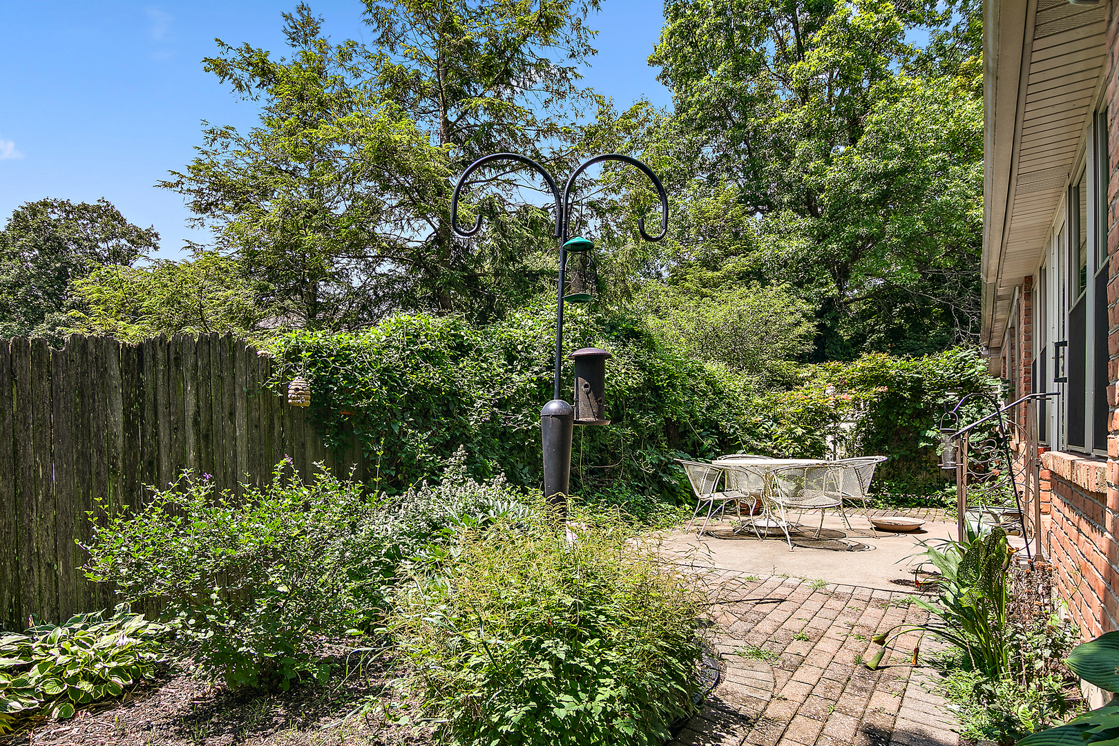 548 Olde Oak Drive, Unit 548 Bourbonnais, IL 60914 - Photo 11 of 26 a backyard of a house with lots of green space
