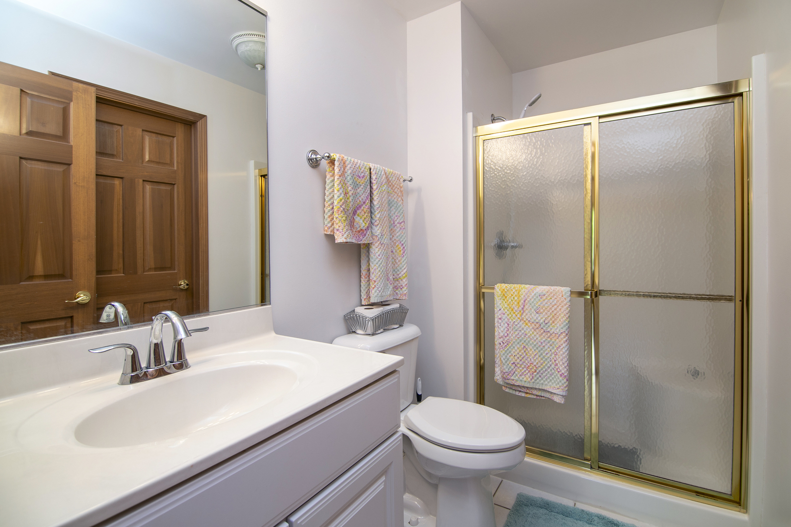 548 Olde Oak Drive, Unit 548 Bourbonnais, IL 60914 - Photo 17 of 26 a bathroom with a sink toilet and shower