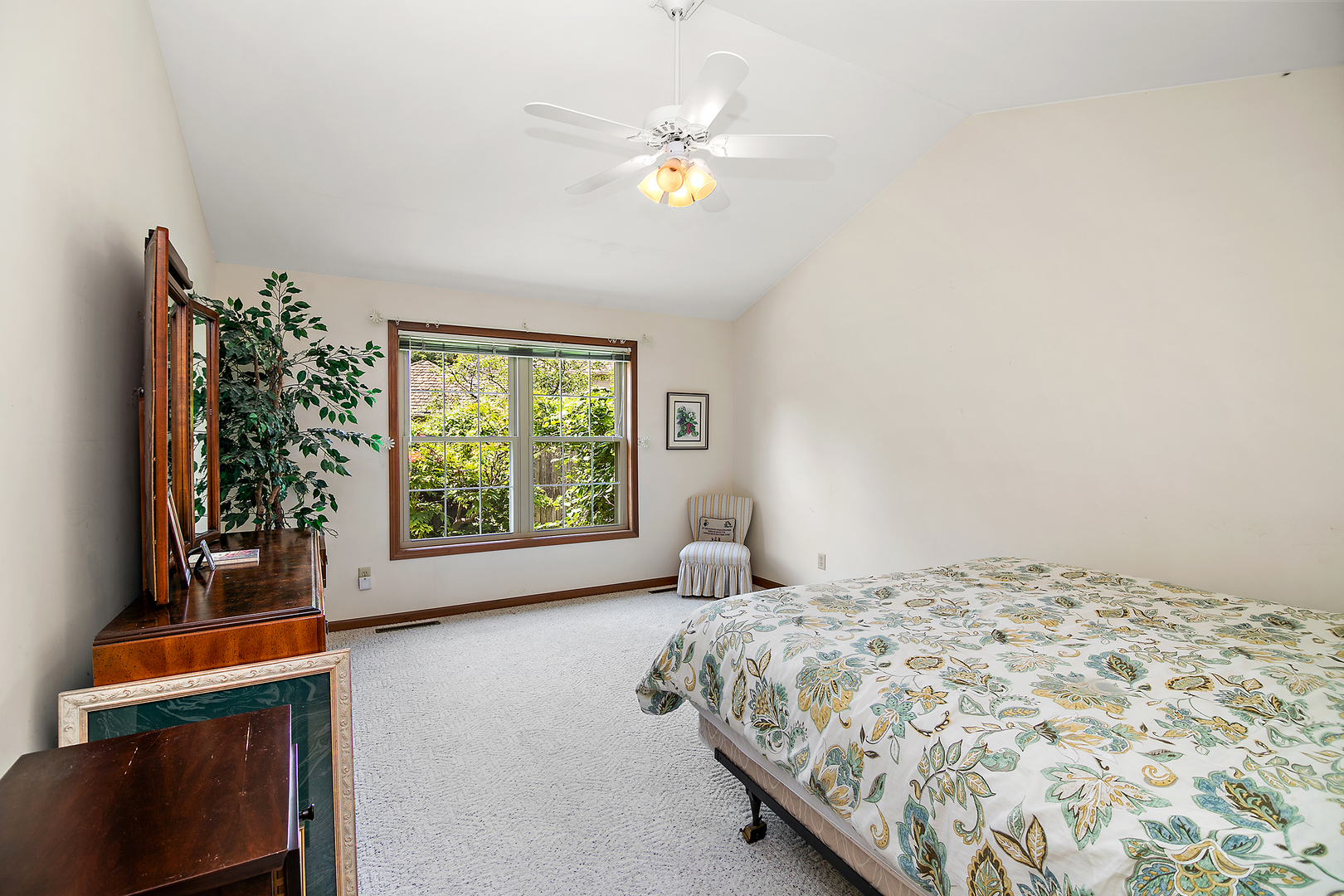 548 Olde Oak Drive, Unit 548 Bourbonnais, IL 60914 - Photo 21 of 26 a bedroom with a large bed and a window