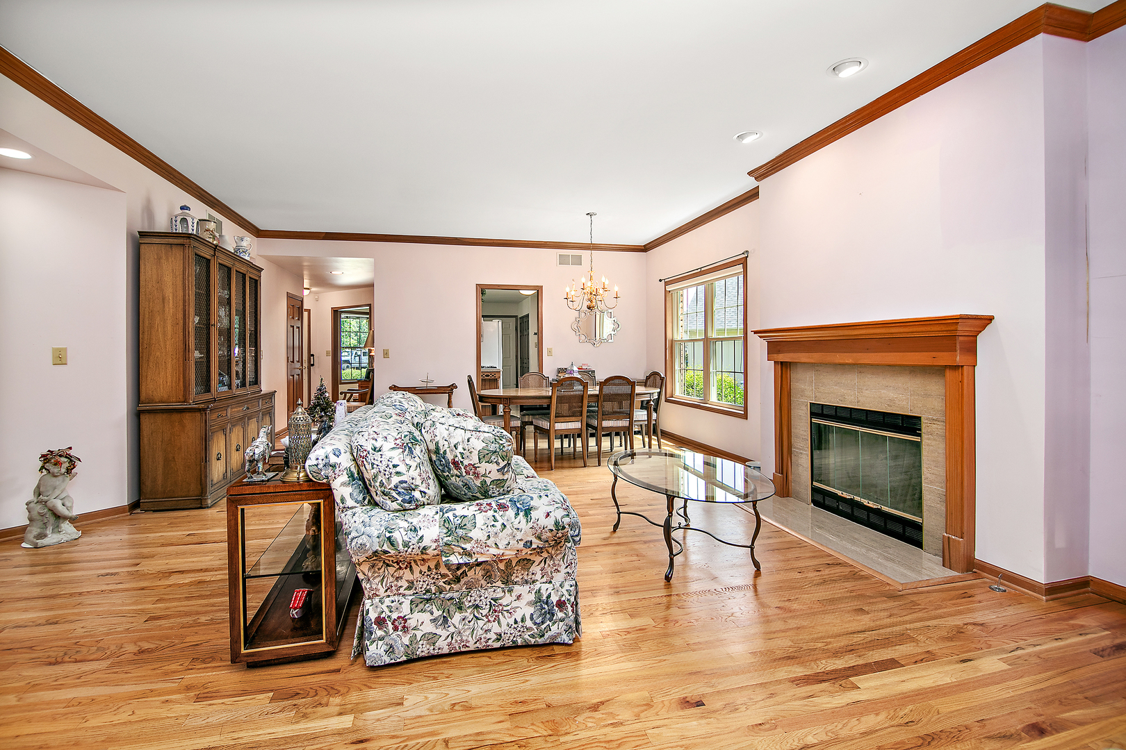 548 Olde Oak Drive, Unit 548 Bourbonnais, IL 60914 - Photo 4 of 26 a living room with furniture and a fireplace