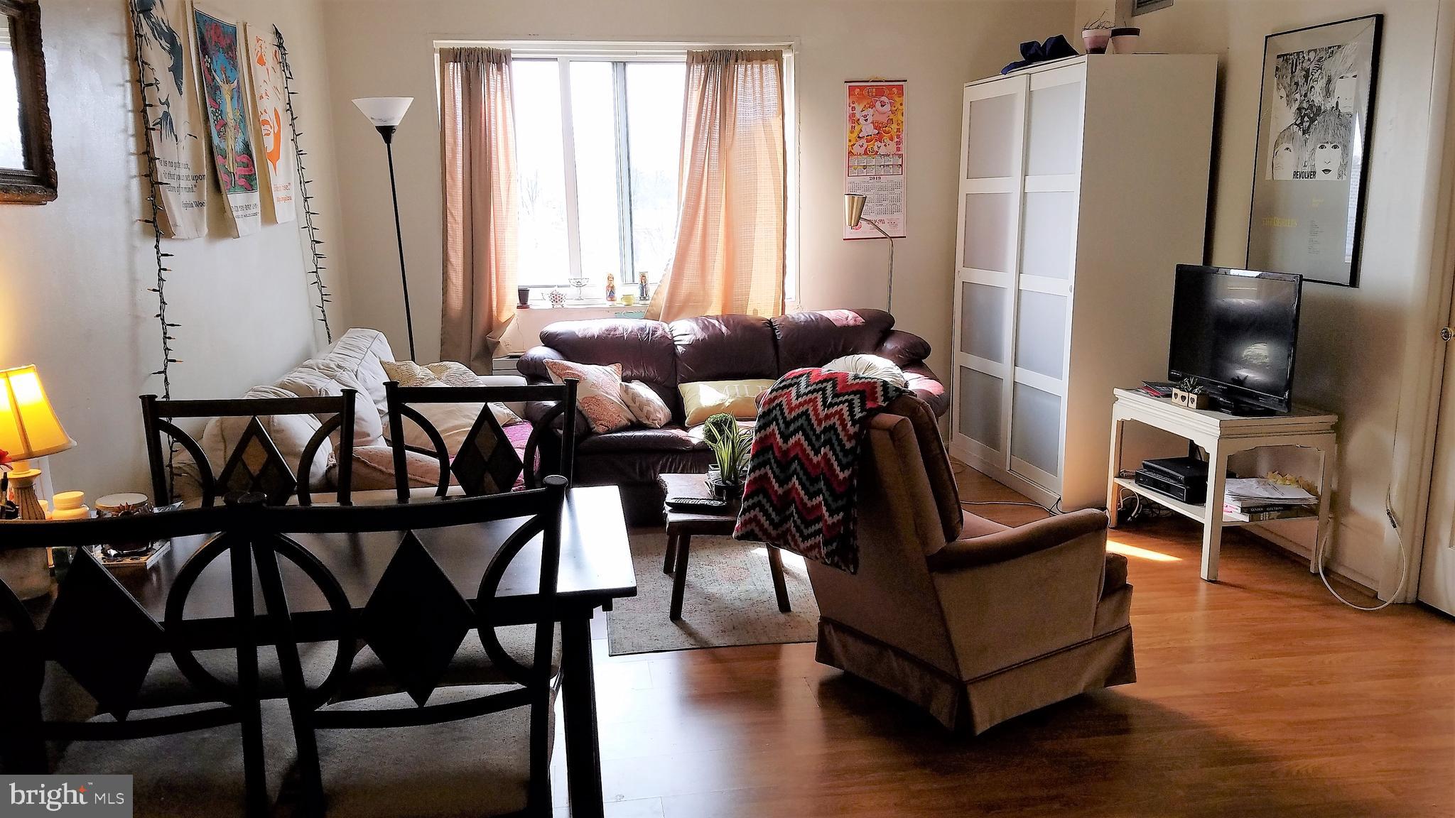 4330 Hartwick Road, Unit 613 College Park, MD 20740 - Photo 2 of 22 Living room with engineer wood floor