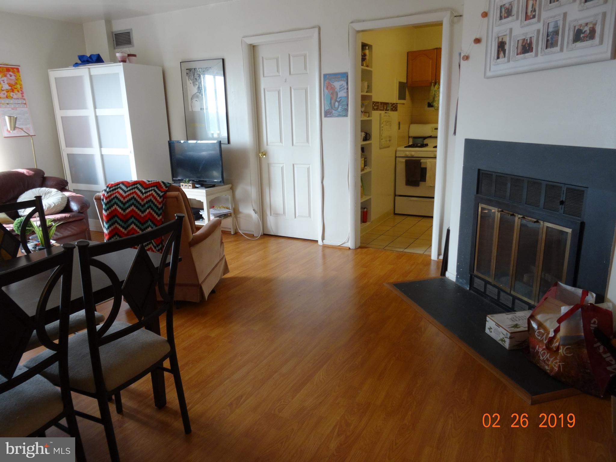 4330 Hartwick Road, Unit 613 College Park, MD 20740 - Photo 3 of 22 Living room with fireplace