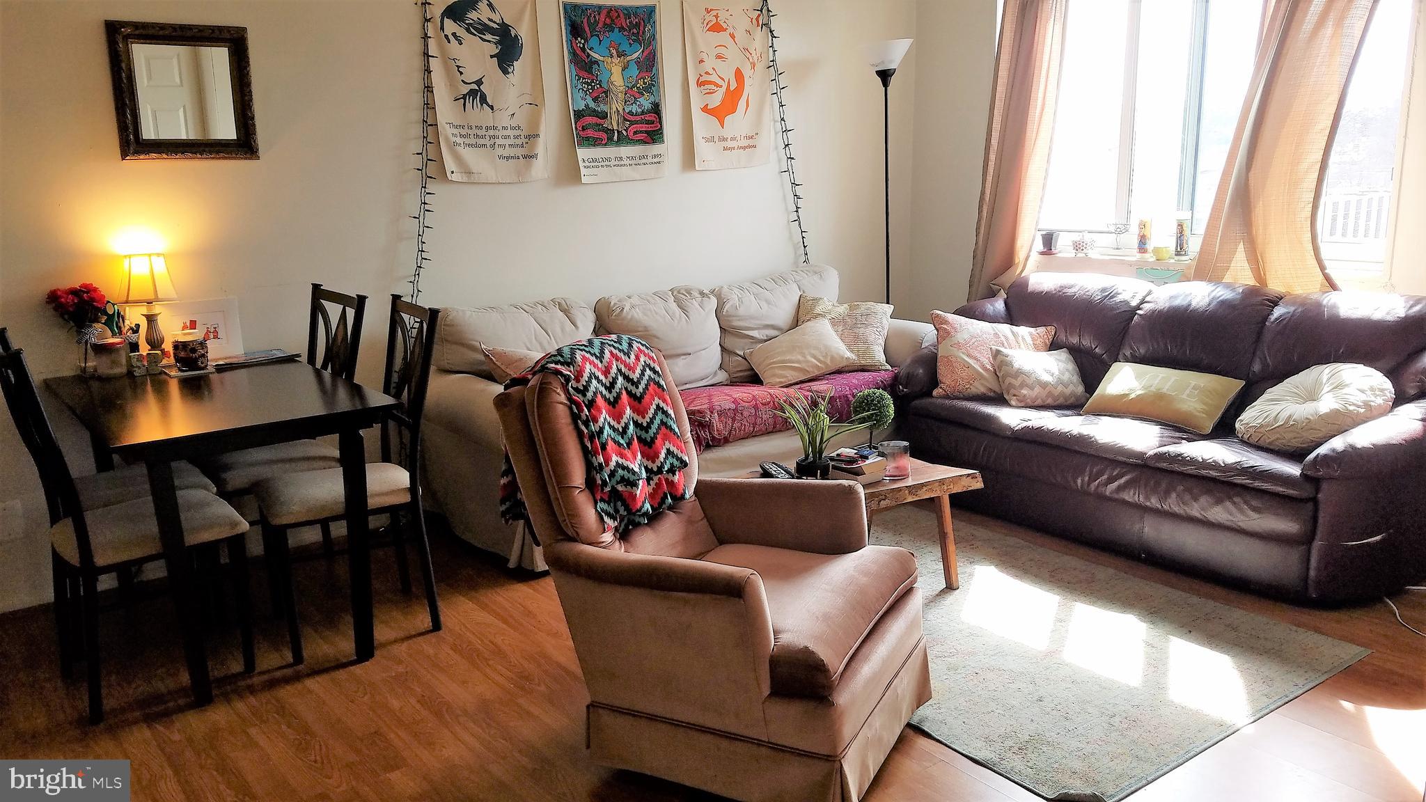 4330 Hartwick Road, Unit 613 College Park, MD 20740 - Photo 7 of 22 Living room with engineer wood floor