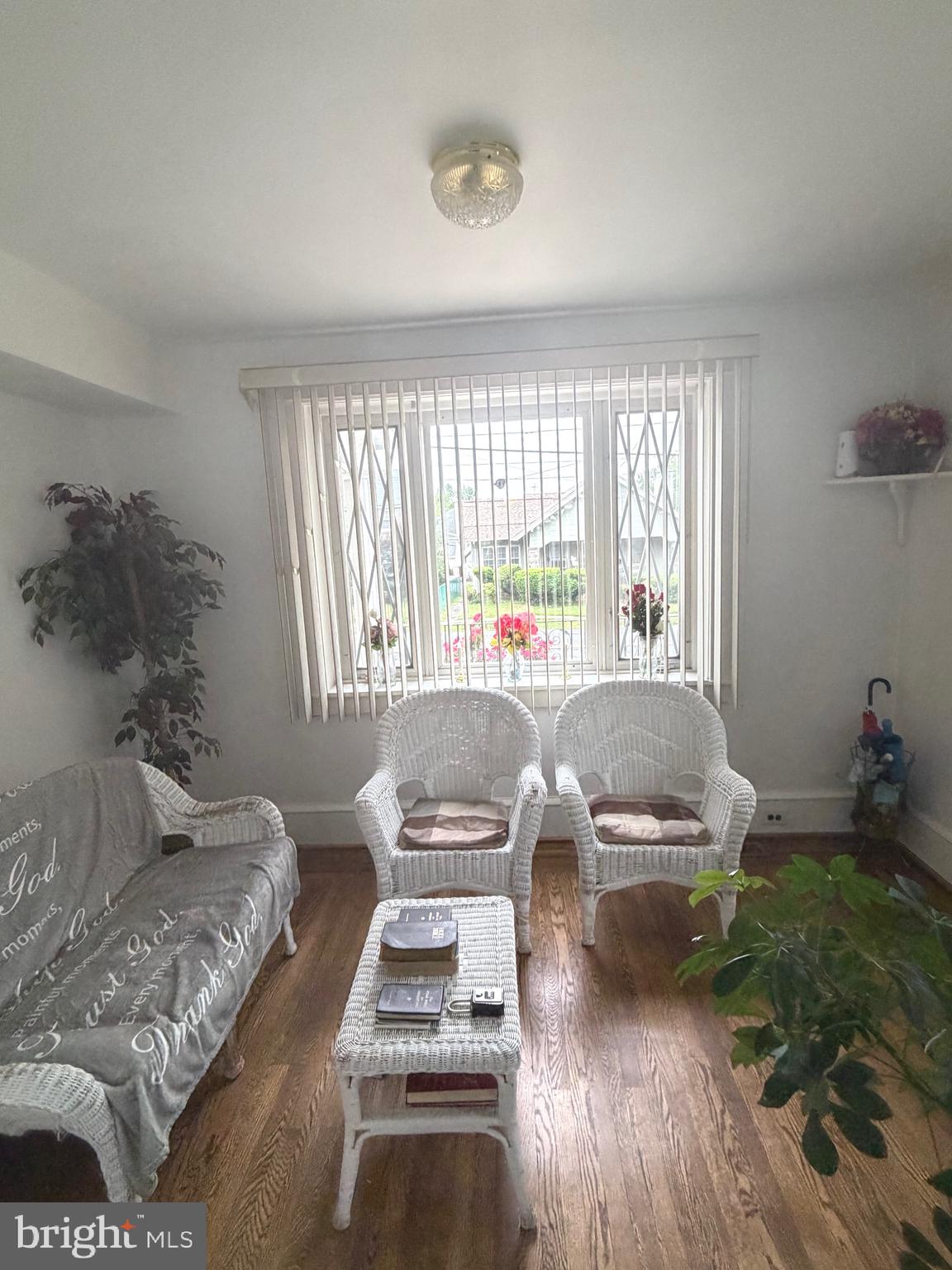 463 Burmont Road Drexel Hill, PA 19026 - Photo 14 of 39 a living room with furniture and a large window