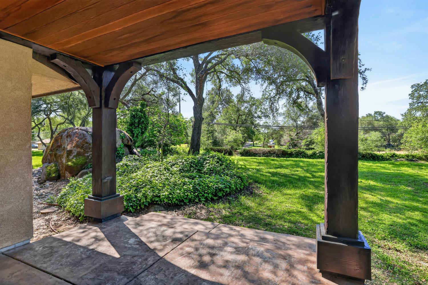 7021 Horseshoe Bar Road Loomis, CA 95650 - Photo 30 of 77 a front view of a house with garden