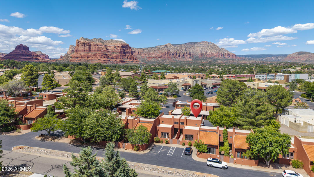 165 Verde Valley School Road, Unit 6 Sedona, AZ 86351 - Photo 36 of 40 an aerial view of residential houses with outdoor space and ocean view