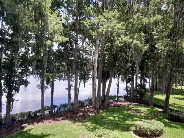 a view of a lake from a balcony