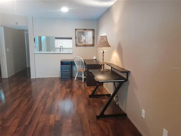 a kitchen with a sink stove and refrigerator