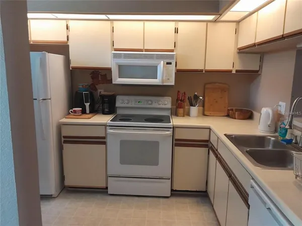 a view of kitchen and living room