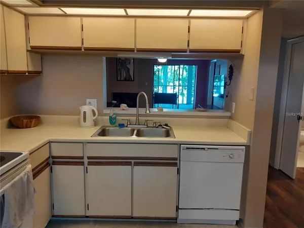 a view of storage and utility room with washer and dryer