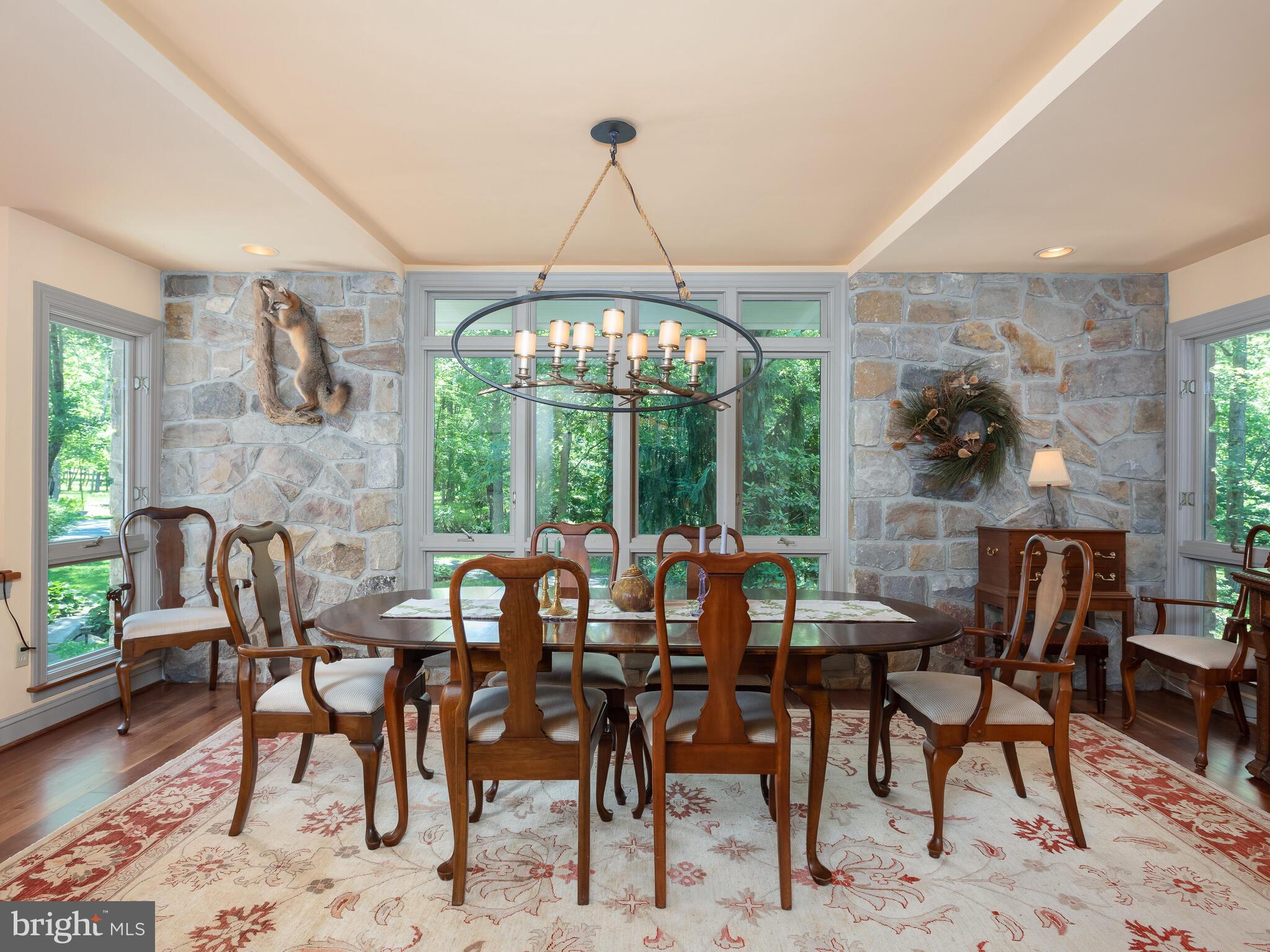324 Lucas Road Phoenixville, PA 19460 - Photo 14 of 63 Expansive Dining Rm w/abundant windows/stone wall!