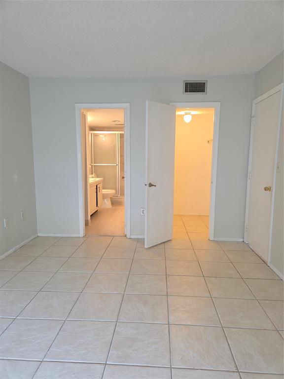 4158 Inverrary Drive, Unit 104 Lauderhill, FL 33319 - Photo 16 of 40 a view of an empty room with a window