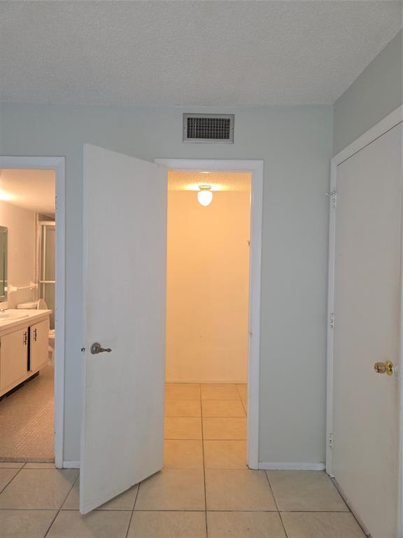 4158 Inverrary Drive, Unit 104 Lauderhill, FL 33319 - Photo 17 of 40 a view of a hallway to rooms