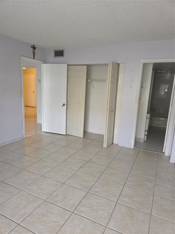 4158 Inverrary Drive, Unit 104 Lauderhill, FL 33319 - Photo 23 of 40 an empty room with a bathroom