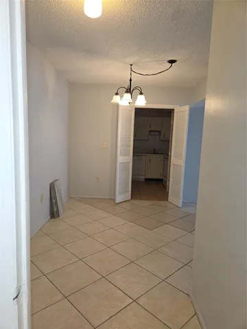 a view of a livingroom with a furniture
