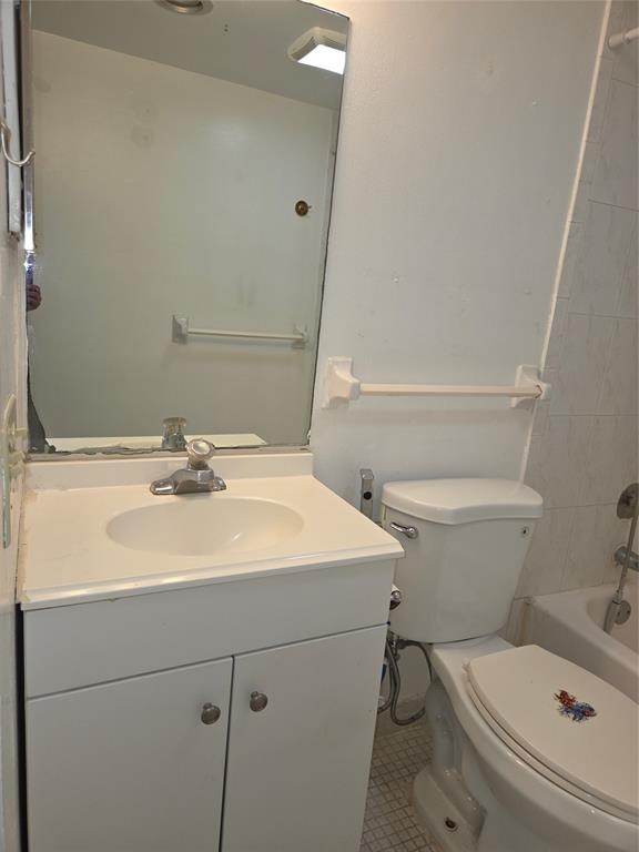 4158 Inverrary Drive, Unit 104 Lauderhill, FL 33319 - Photo 39 of 40 a bathroom with a sink a toilet and shower