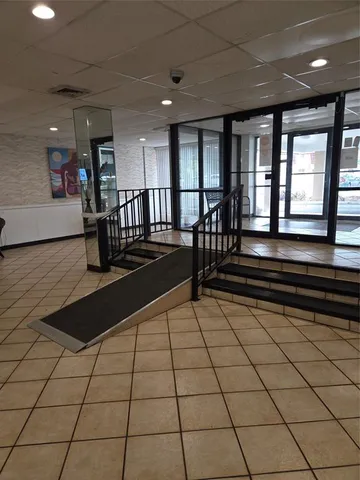 a lobby with glass door