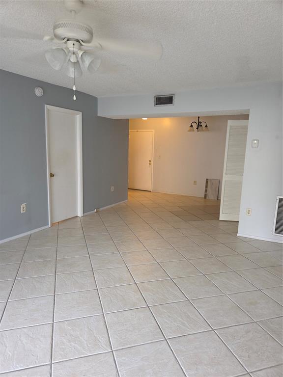 4158 Inverrary Drive, Unit 104 Lauderhill, FL 33319 - Photo 10 of 40 a view of an empty room with a window