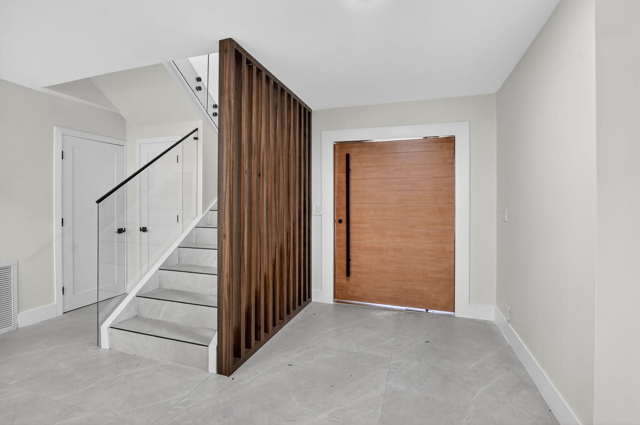 7134 San Sebastian Drive Boca Raton, FL 33433 - Photo 3 of 73 a view of a hallway with staircase