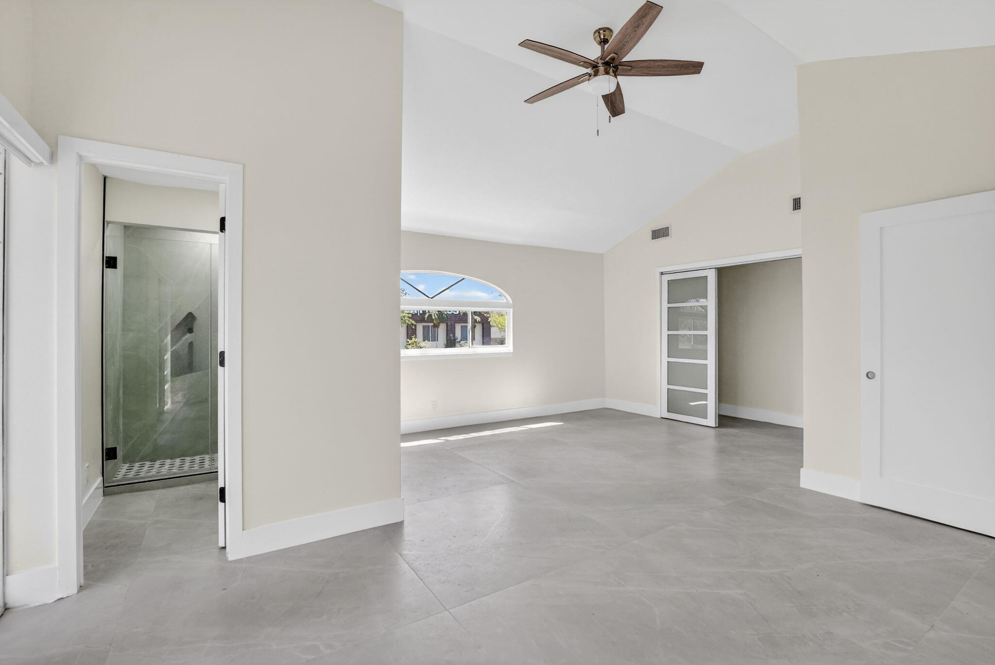 7134 San Sebastian Drive Boca Raton, FL 33433 - Photo 56 of 73 an empty room with closet and windows