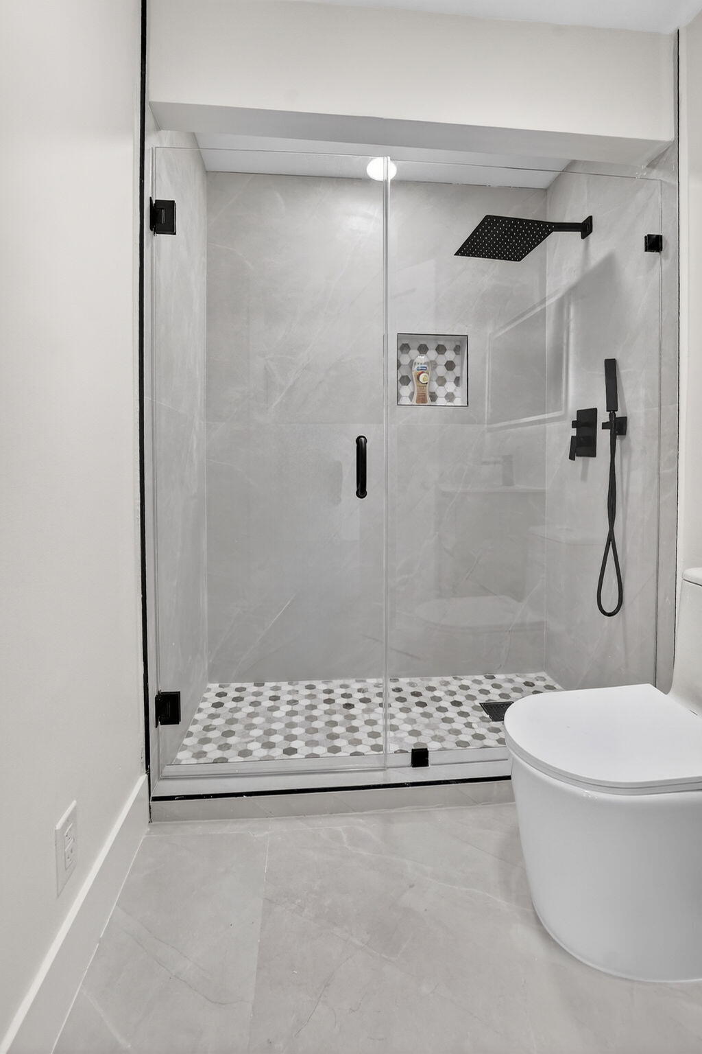 7134 San Sebastian Drive Boca Raton, FL 33433 - Photo 61 of 73 a bathroom with a toilet and a shower