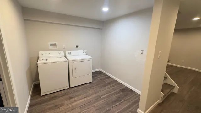 a utility room with dryer and washer