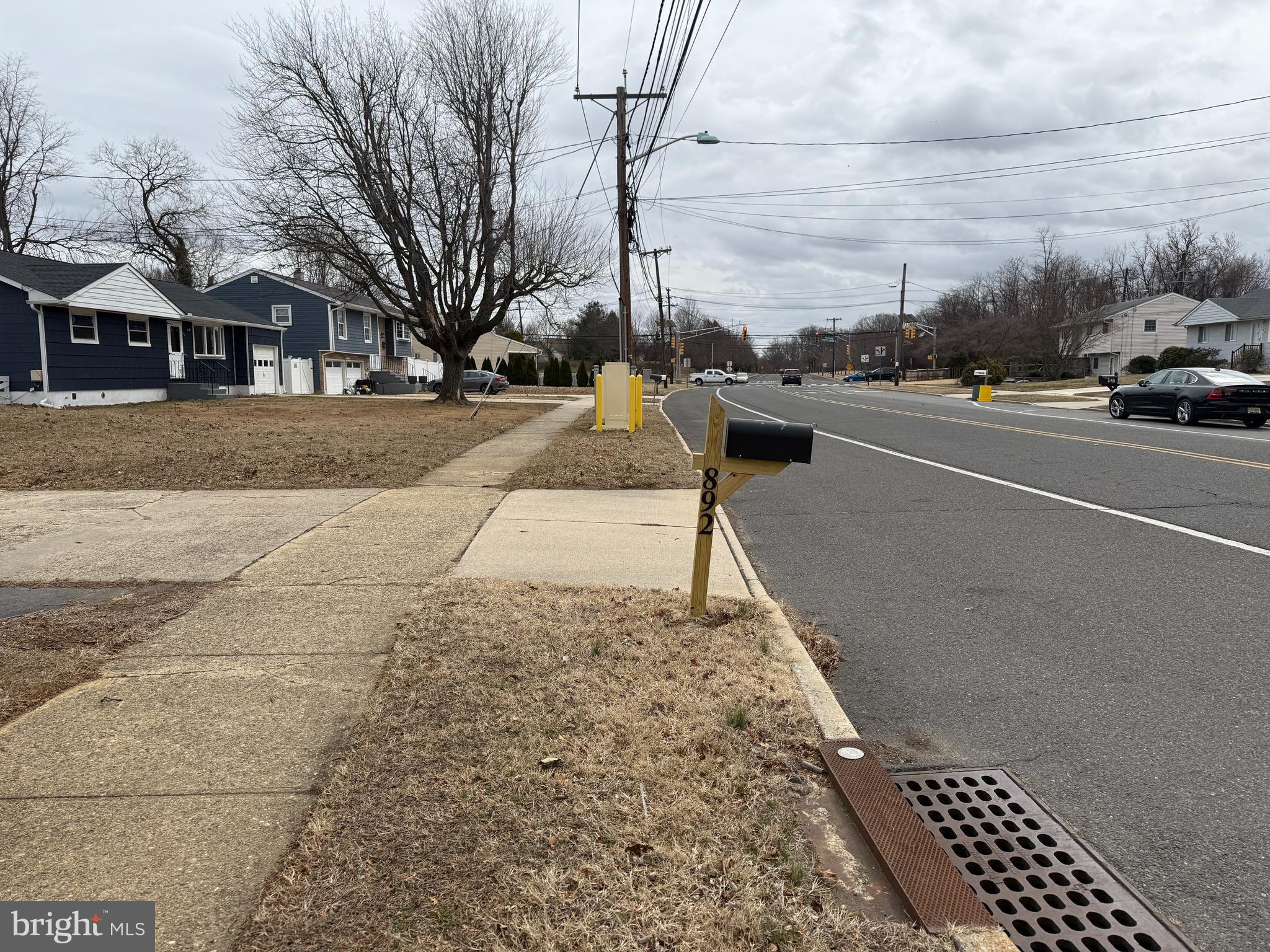 892 Estates Boulevard Hamilton, NJ 08690 - Photo 3 of 10 a view of a city street lined with buildings