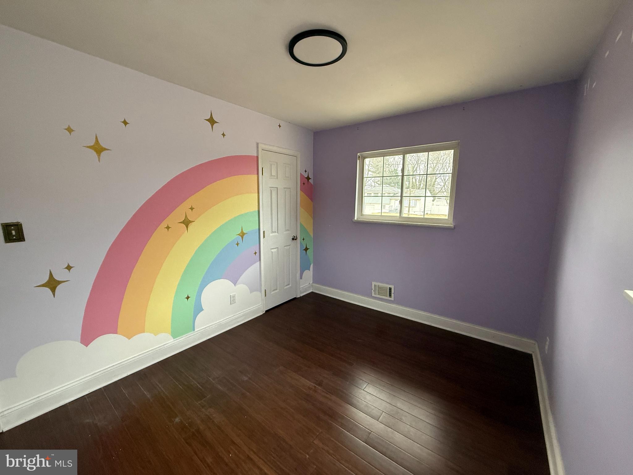 892 Estates Boulevard Hamilton, NJ 08690 - Photo 8 of 10 a view of a room with wooden floor and window