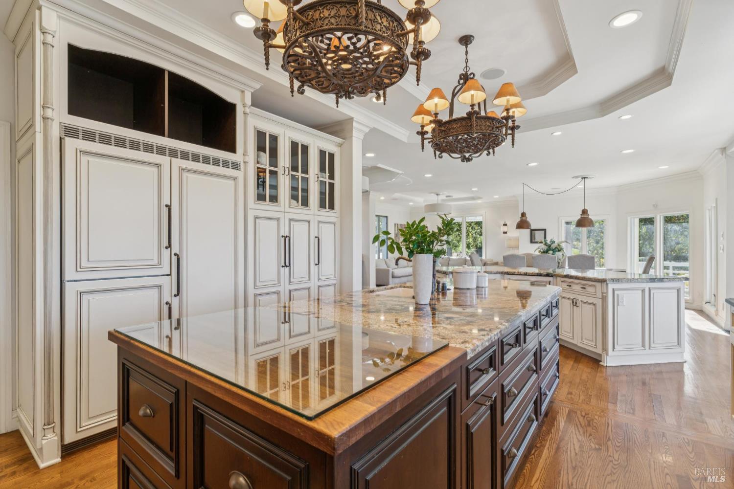 3265 Soda Canyon Road Napa, CA 94558 - Photo 13 of 36 a view of a dining room with furniture wooden floor and chandelier