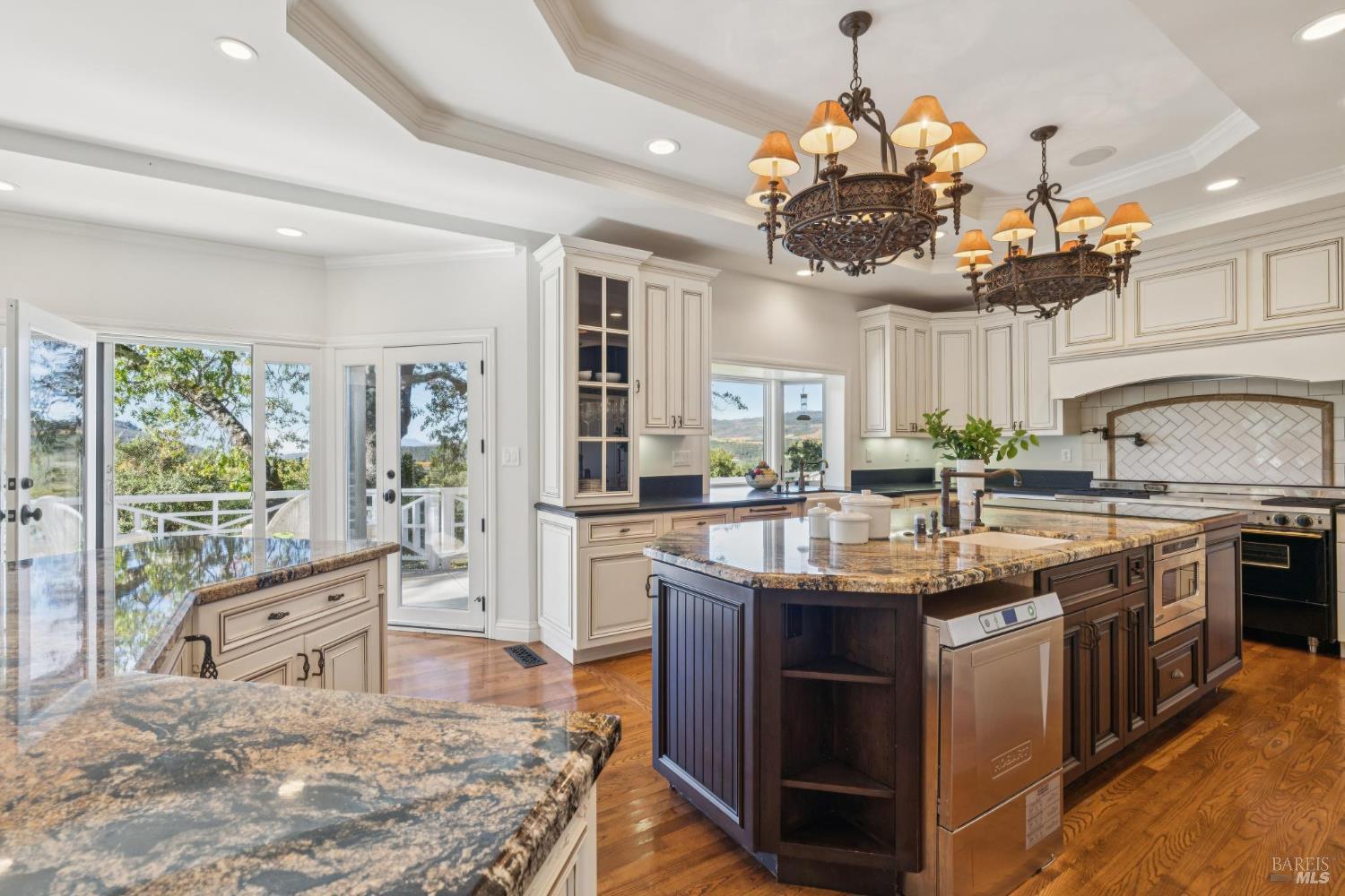 3265 Soda Canyon Road Napa, CA 94558 - Photo 18 of 36 a kitchen with stainless steel appliances granite countertop a sink and cabinets