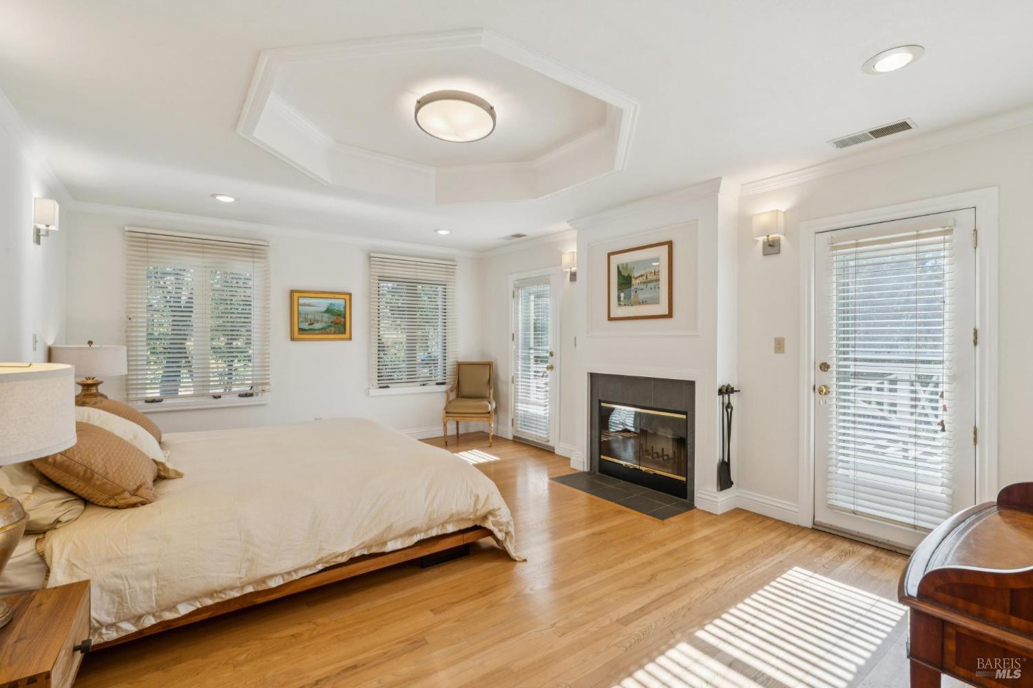 3265 Soda Canyon Road Napa, CA 94558 - Photo 29 of 36 a bedroom with a bed and a fireplace