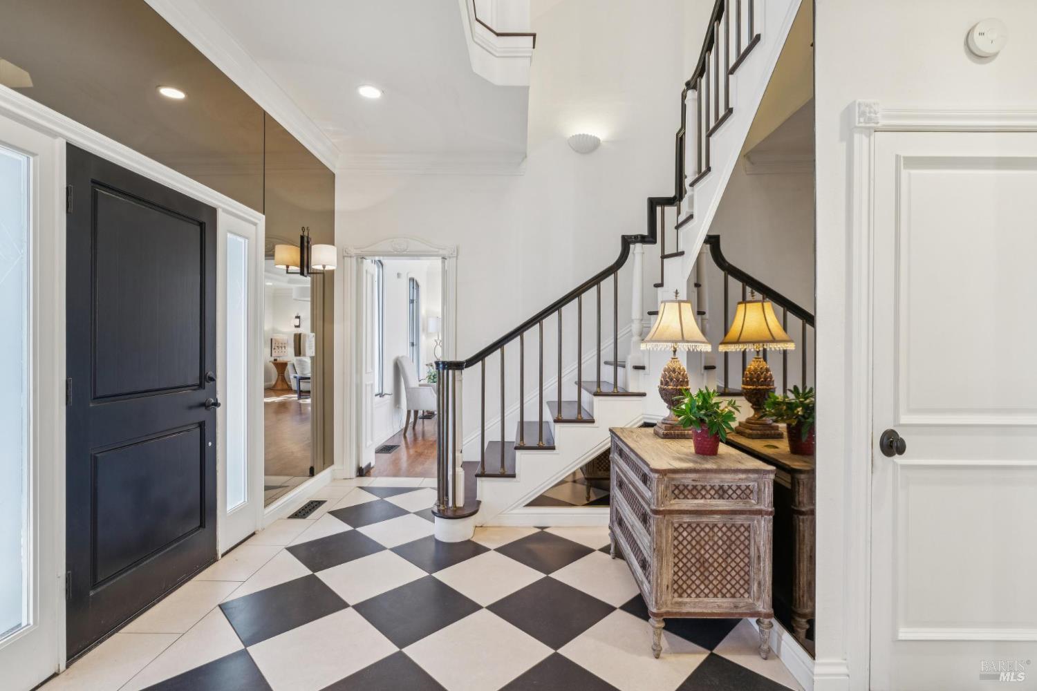 3265 Soda Canyon Road Napa, CA 94558 - Photo 6 of 36 a view of entryway with wooden floor and stairs