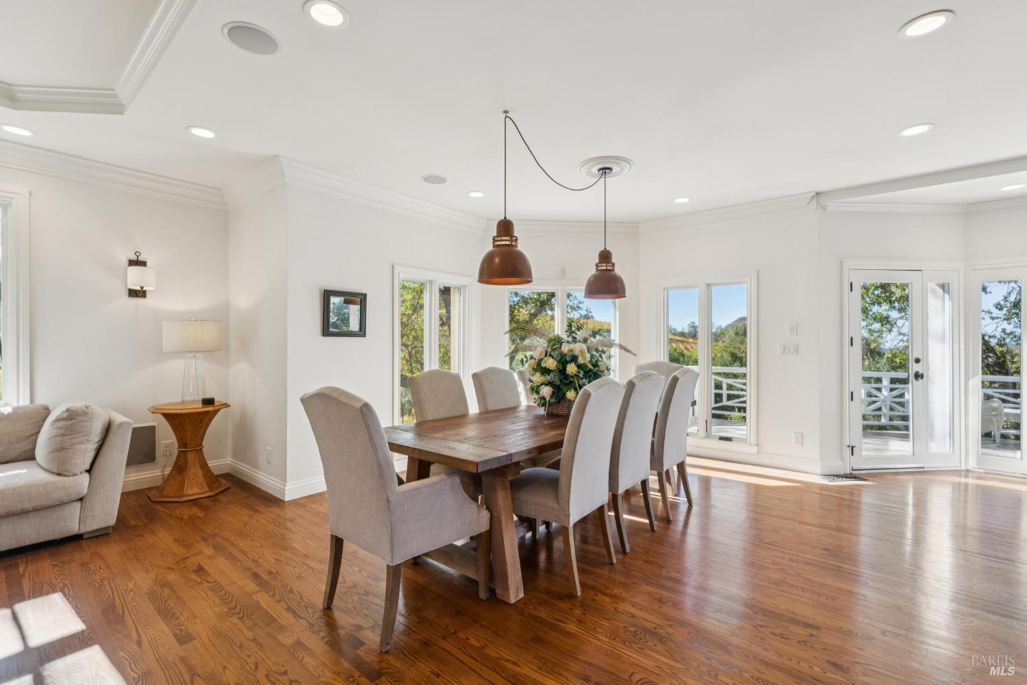 3265 Soda Canyon Road Napa, CA 94558 - Photo 8 of 36 a view of a dining room with furniture window and wooden floor