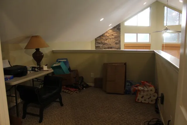 a room with gym equipment and a window