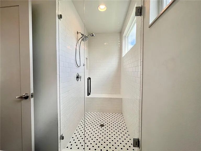 4601 Kitty Avenue, Unit B Austin, TX 78721 - Photo 9 of 14 Large shower upstairs