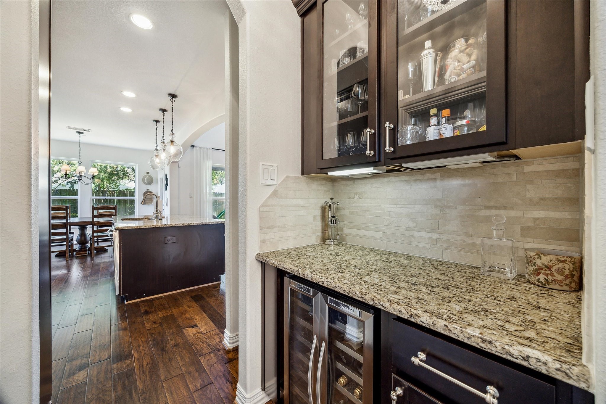 1515 Thornton Road Houston, TX 77018 - Photo 17 of 38 Between the kitchen space and formal dining room, you will find the butler's station, complete with built-in cabinetry, counter space and supplementary refrigeration.
