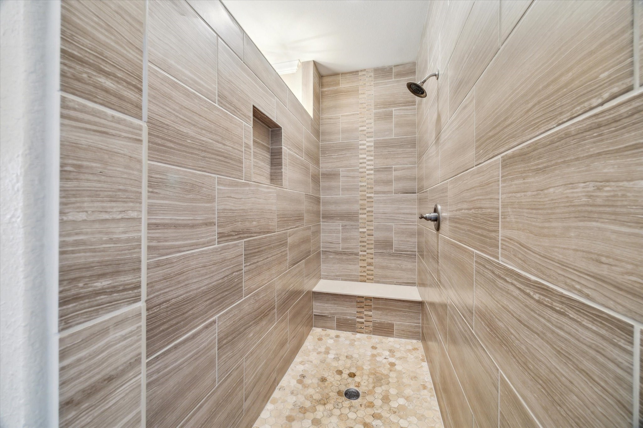 1515 Thornton Road Houston, TX 77018 - Photo 22 of 38 The luxurious primary bathroom features dual full-sized vanities, an expansive walk-in shower, and an oversized bathtub beneath a semi-transparent window for ample natural light and privacy.