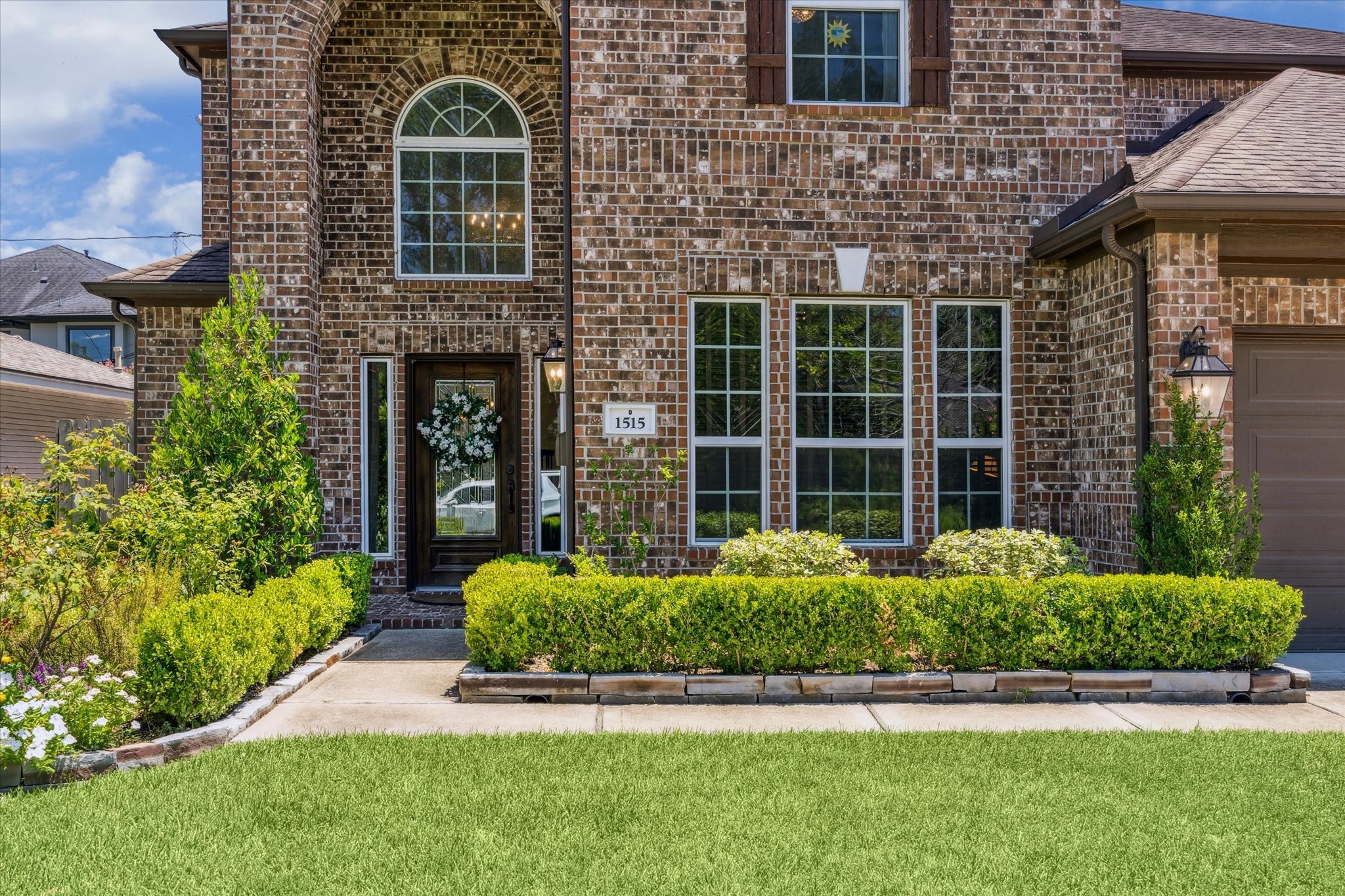 1515 Thornton Road Houston, TX 77018 - Photo 3 of 38 Lush landscaping welcomes guests along the front walkway.