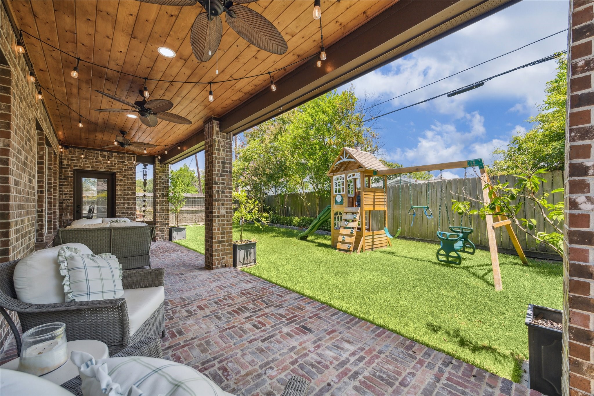 1515 Thornton Road Houston, TX 77018 - Photo 36 of 38 The spacious patio at the back of the home offers a lovely exterior entertaining space with multiple seating areas. Fully enclosed, the back and side yards feature ample recreational space and superb privacy.