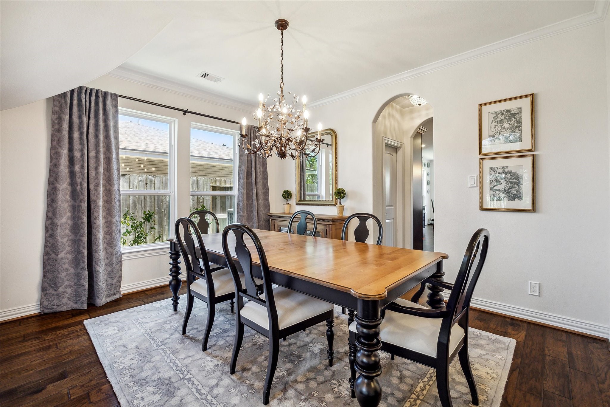 1515 Thornton Road Houston, TX 77018 - Photo 7 of 38 The formal dining room of the home features a large window and convenient access to the butler's pantry and kitchen space.