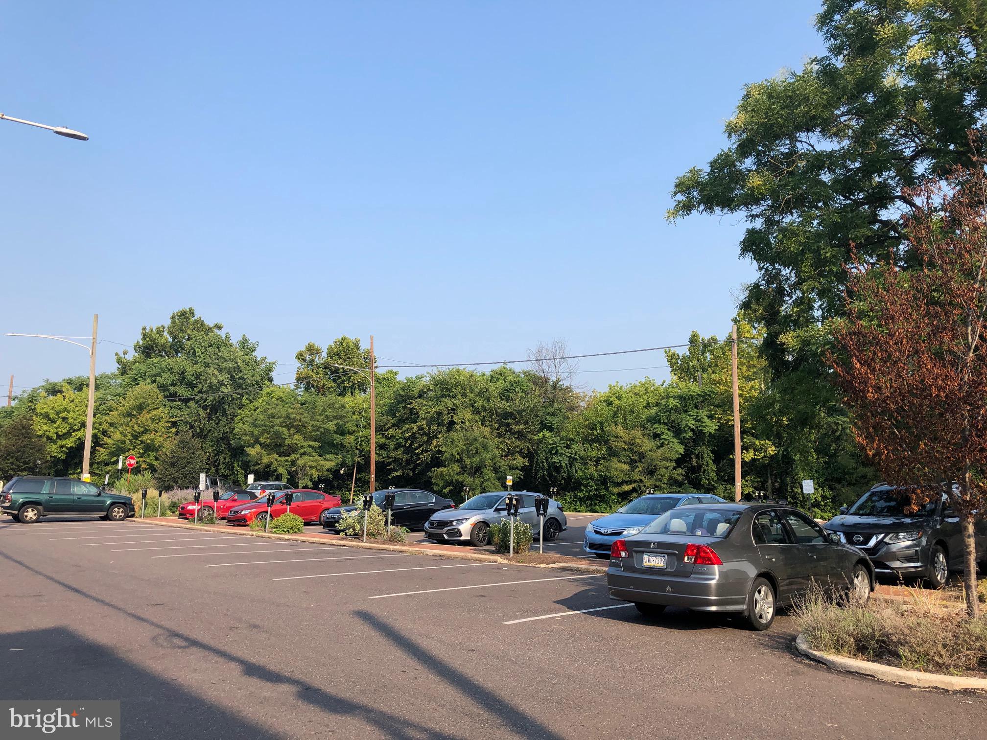 317 Bridge Street, Unit 2 Phoenixville, PA 19460 - Photo 2 of 12 a view of street with parked cars