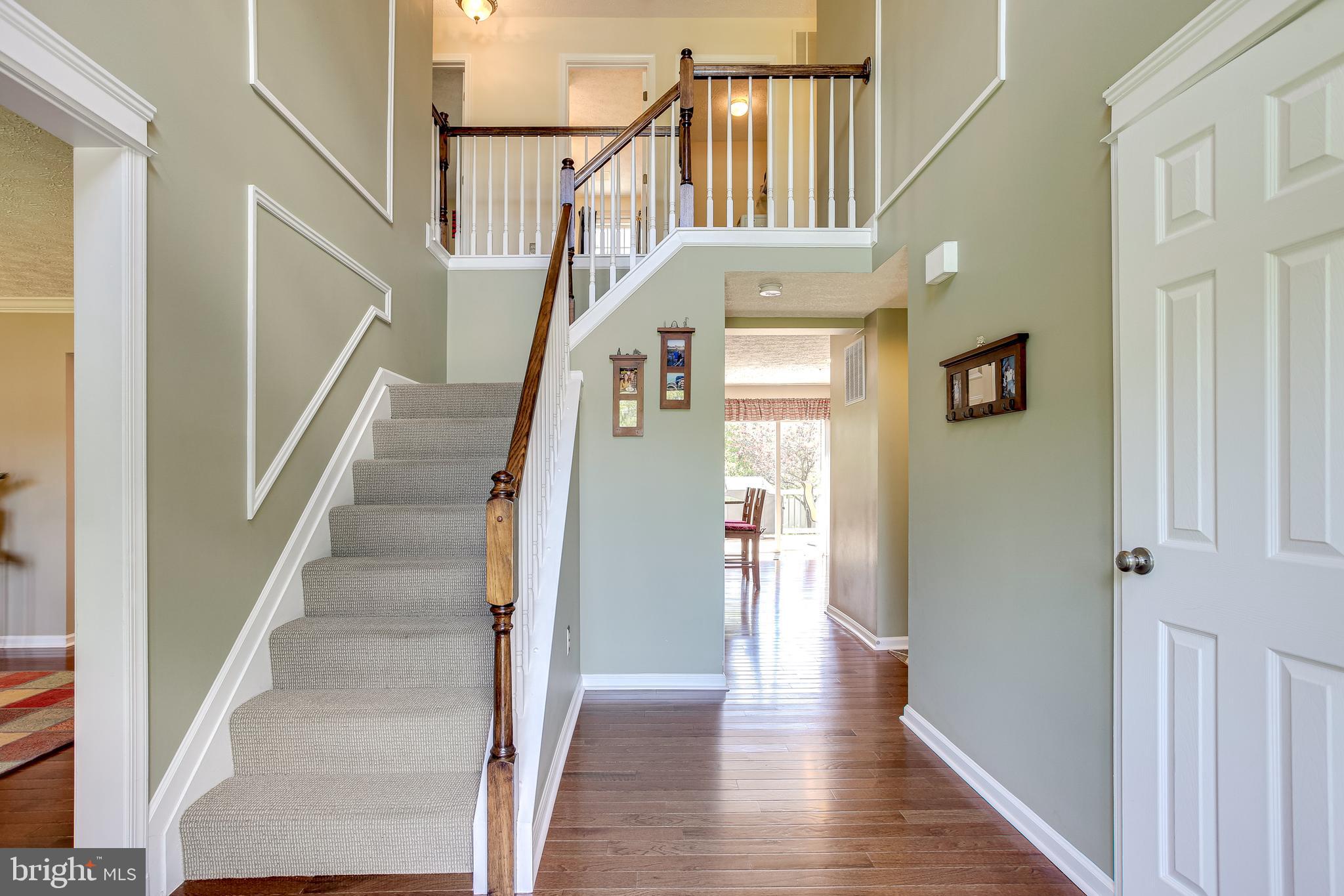 8247 Spring Branch Court Laurel, MD 20723 - Photo 4 of 36 Two Story Foyer Welcomes You Home