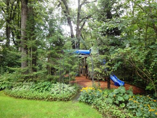 1309 Inverlieth Road Lake Forest, IL 60045 - Photo 13 of 13 a backyard of a house with a yard and tree