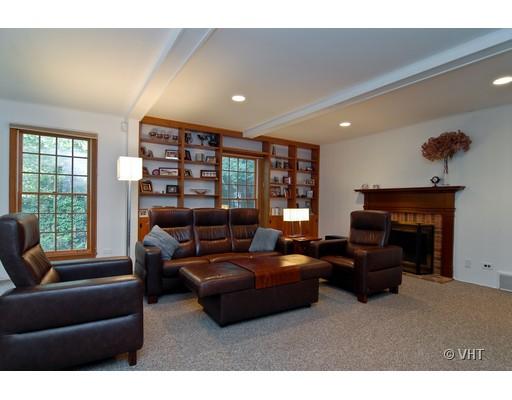 1309 Inverlieth Road Lake Forest, IL 60045 - Photo 3 of 13 a living room with furniture and a fireplace