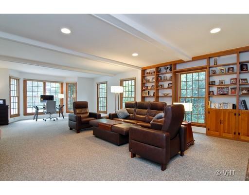 1309 Inverlieth Road Lake Forest, IL 60045 - Photo 4 of 13 a living room with furniture and a flat screen tv