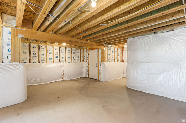1144 South 4475 West West Point, UT 84015 - Photo 28 of 30 Unfinished basement with concrete flooring and exposed wood ceiling joists