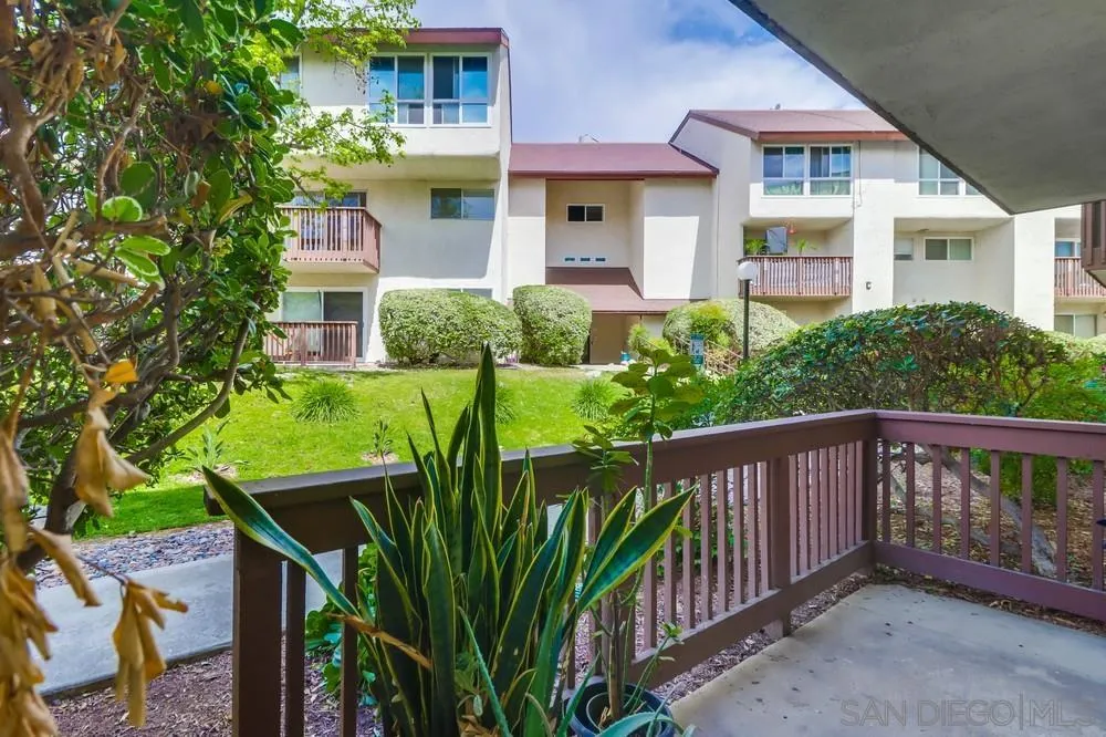 6191 Rancho Mission Road, Unit 105 San Diego, CA 92108 - Photo 20 of 31 a view of a house with backyard and porch